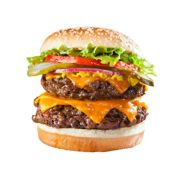A double cheeseburger from Flaming Bites Halal Grill with lettuce, tomato, pickles, and onions.